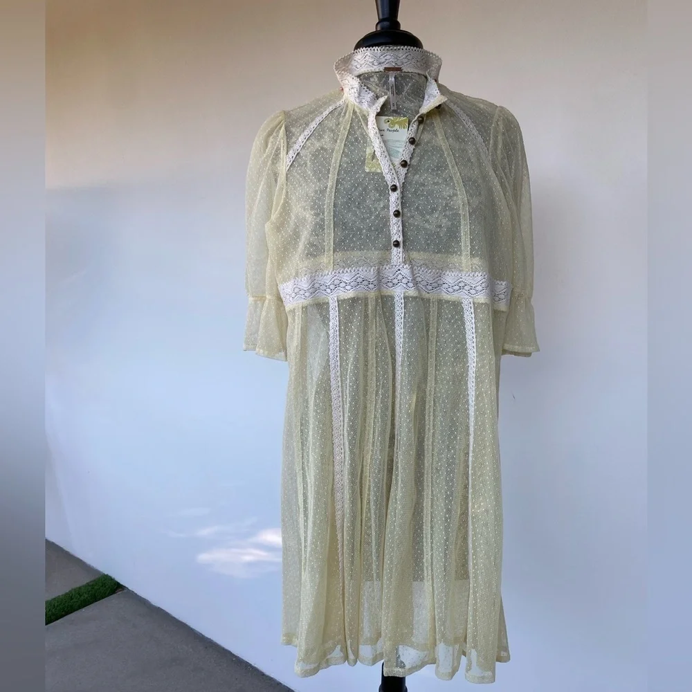 Elegant Cream Lace Dress by Free People size medium.